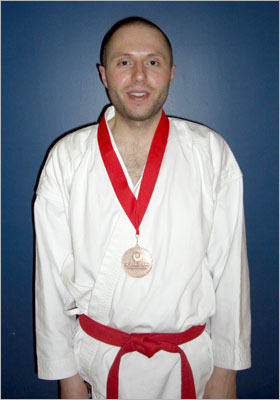 Congratulations to Chris Plastow for winning the Bronze Medal in the Kyu Grade Championship Finals in November 2009.