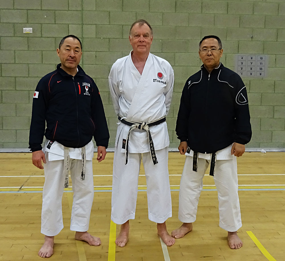 Sensei Martin at the JKA England Spring Course in Crawley with Sensei Ogura 7th Dan ( left ) and Sensei Hashiguchi 7th Dan ( right )